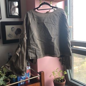 open back blouse with trumpet sleeves